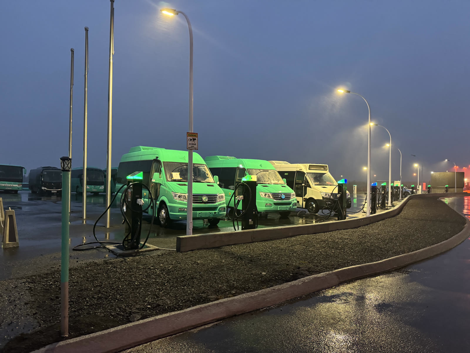 YES-EU DC chargers with the green fleet charging in Iceland at dusk